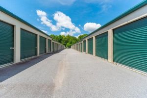 Drive through Storage Units with Green Doors
